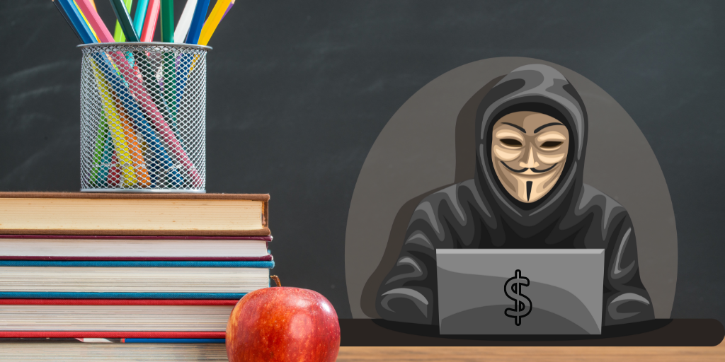 Hacker in front of school chalkboard